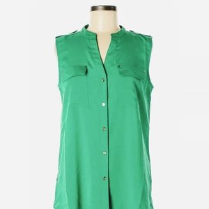 Women's button down blouse Turquoise/Teal in color..